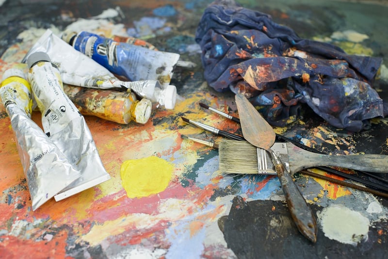 Artist painting on canvas